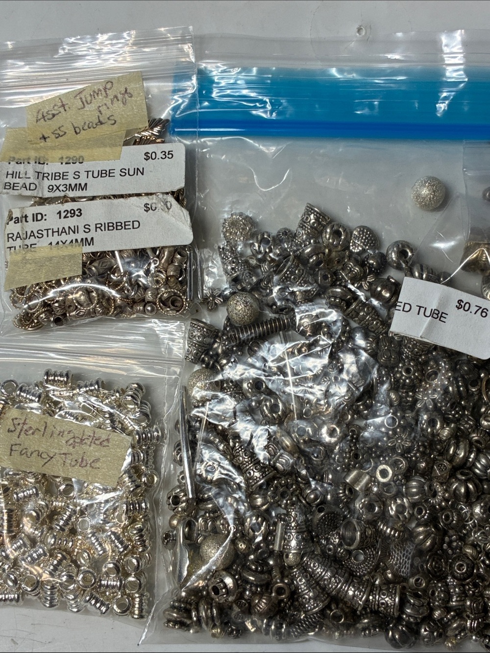 Mixed lot of Sterling silver and silver plated beads